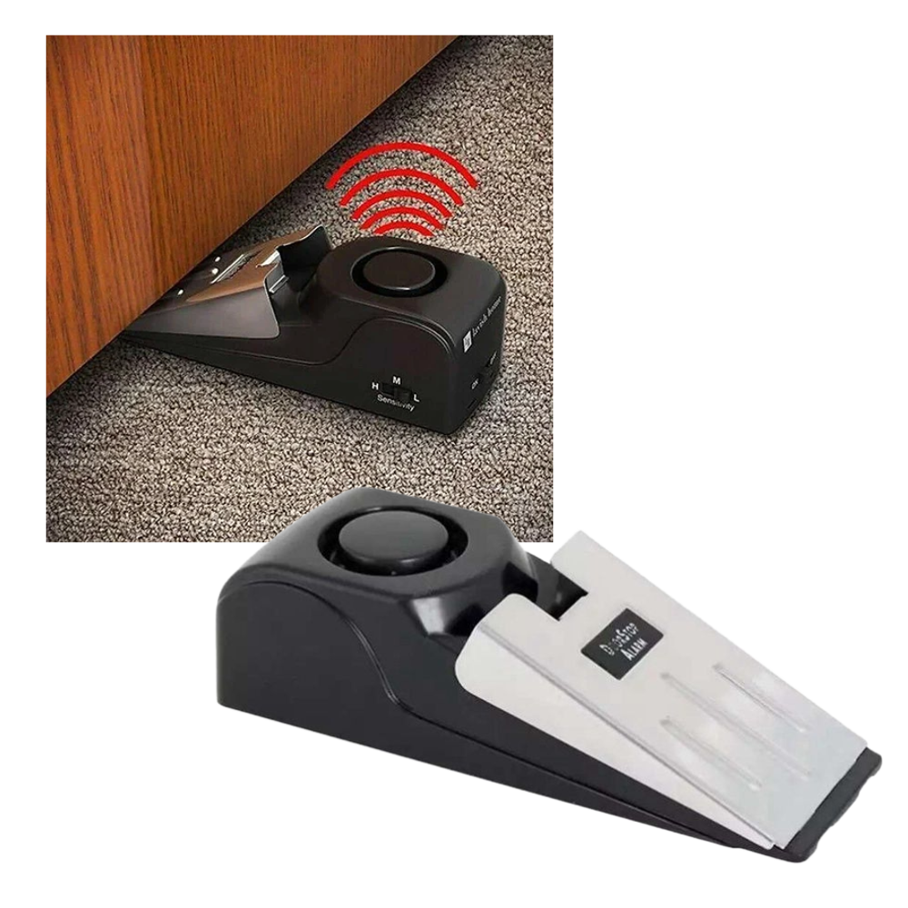 Alarme de segurança com cale-porte Febmiss, peça de quincaillerie para portas, visível na imagem com dispositivo preto e suporte.