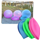 Estrutura inflável rosa da First Deal com balão de bolhas mágicas, ideal para decoração divertida e colorida.