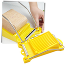 Decoupeur e trancheur de alimentos Foeses, utensílios de cozinha brancos, mostrados em uso na imagem.