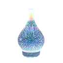 Diffuseur d'huiles essentielles en forme de vase avec motif de feux d'artifice, parfait pour parfums d'intérieur.