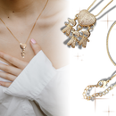 Colar elegante com breloques para mãe, feito pela marca Haribason, com detalhes delicados e design sofisticado.