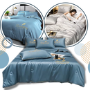 Envoltório de edredom de seda glacê suave da Betiyuaoe, tecido respirável e macio para uma cama elegante e confortável.