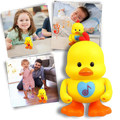 Boneco canarinho brincalhão da Huile com luzes que dança, ideal para diversão infantil em brinquedos e jogos.