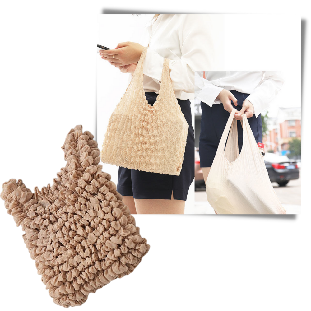 Sac à provisions plissé extensible da JPGIF, saco plástico preto com design dobrável e resistente para compras.