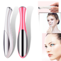 Masseur elétrico multifuncional para o rosto da Kikio, branco, usado para massagem facial e relaxamento.