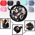 Pochette de maquiagem dobrável com cordão de fechamento da marca Lay-N-Go, trousse de toilette preta e compacta.