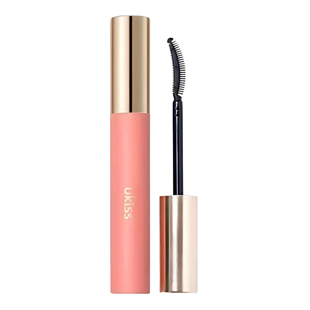 Máscara de cílios Mac com efeito volumizador intenso, escurecida em tom marrom moka, destacando os cílios com definição e volume.