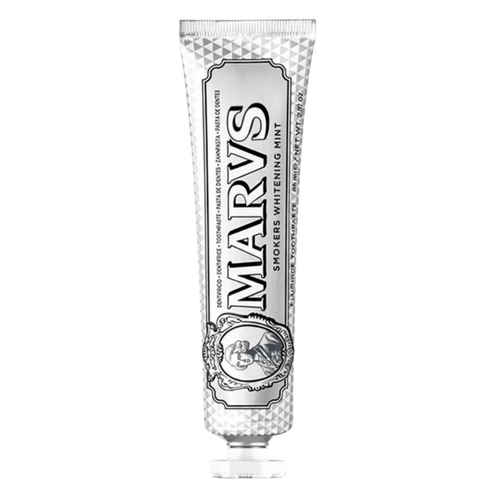 Dentifríce branqueadora Marvis de cuidados bucais com sabor de hortelã, embalagem roxa, para dentes mais brancos.