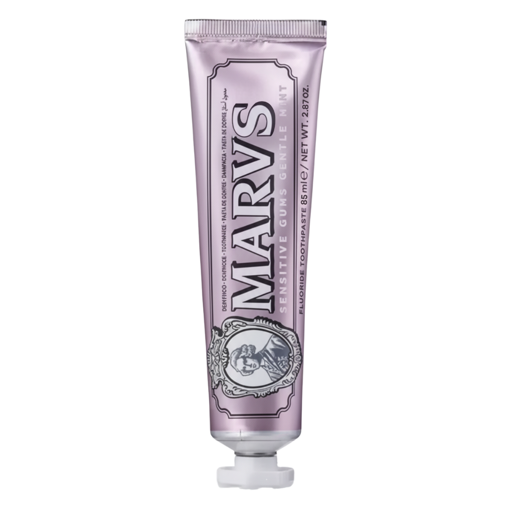 Dentifício branqueador de menta da marca Marvis, cuidado bucal com tubo roxo e fórmula para dentes mais brancos.