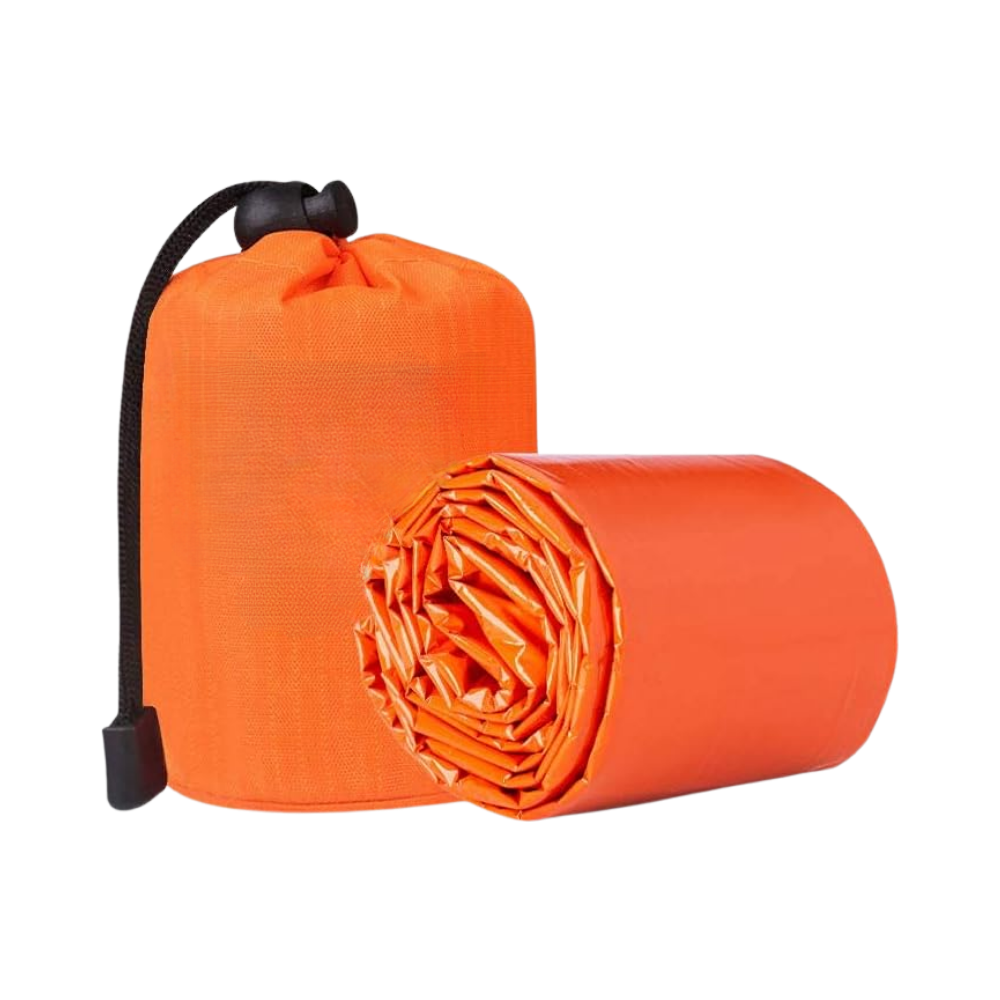 Sac de survie de camping Emergency Zone en Mylar orange, léger et isolante, ideal para situações de emergência e sobrevivência.