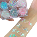 Conjunto de paillettes para rosto e corpo da marca Nyxberryt, com brilho dourado e prateado, ideal para maquiagem e festas.