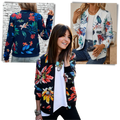 Blusão bomber floral da Ozerty France para roupas de exterior, com mangas longas e estampa de flores brancas.