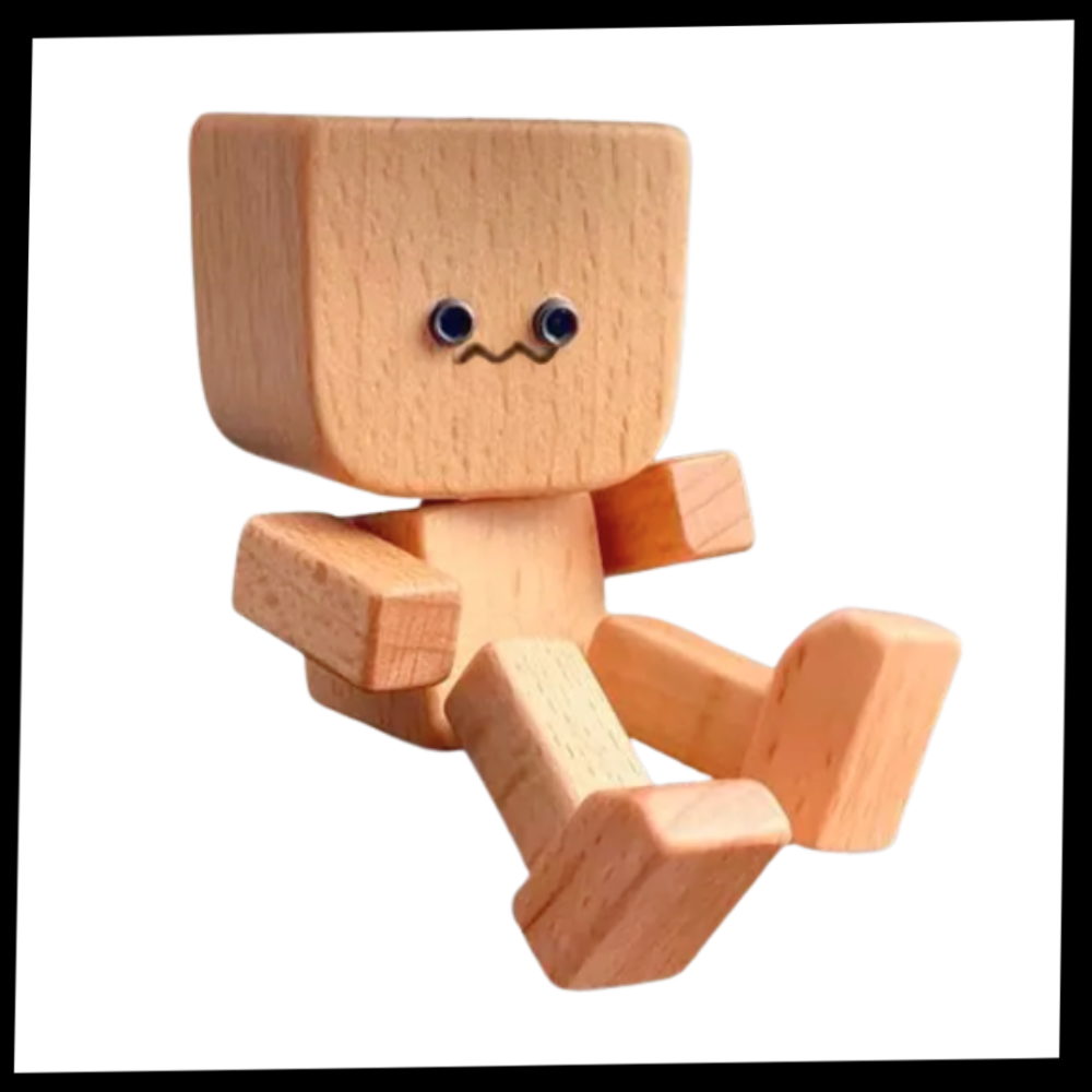 Figurina de madeira do personagem Quirky Bobblehead da marca Frcolor, com movimento de cabeçuda, em embalagem de papelão.