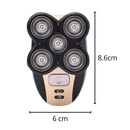 Rasoir elétrico portátil Skull-Shaver para rasagem e cuidados pessoais, com cabeça de corte e design compacto.