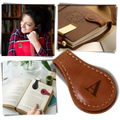 Marcador de página magnético de couro personalizado Menrkoo, com design elegante e acabamento sofisticado.