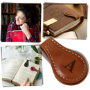 Marcador de página magnético de couro personalizado Menrkoo, com design elegante e acabamento sofisticado.