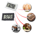 Mini termômetro e higrômetro digital Sodial, com tela LCD, para medição de temperatura e umidade em ambientes domésticos.