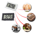Mini termômetro e higrômetro digital Sodial, com tela LCD, para medição de temperatura e umidade em ambientes domésticos.