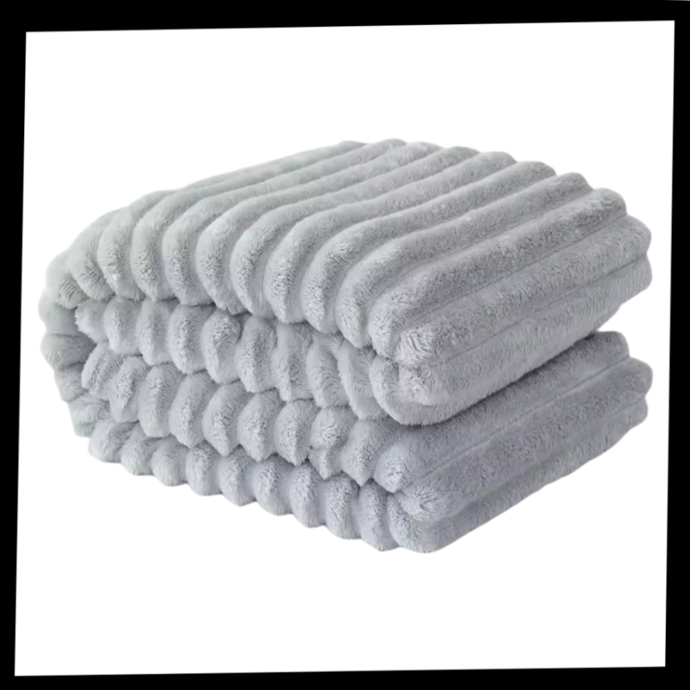 Cobertor de flanela macio e confortável da marca Home, aparência aconchegante e tecido suave para cama ou sofá.