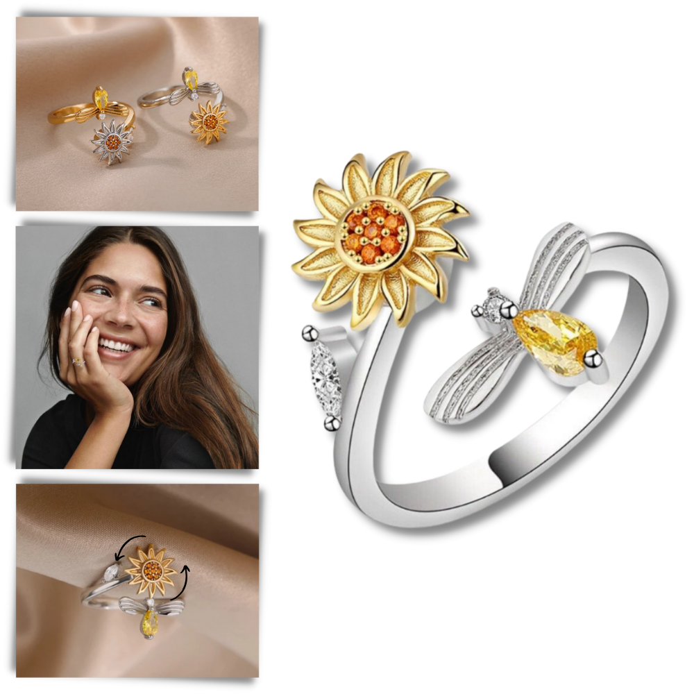 Anel giratório de girassol da marca Helevia, com design de flor de girassol e acabamento detalhado em metal.