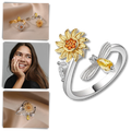 Anel giratório de girassol da marca Helevia, com design de flor de girassol e acabamento detalhado em metal.