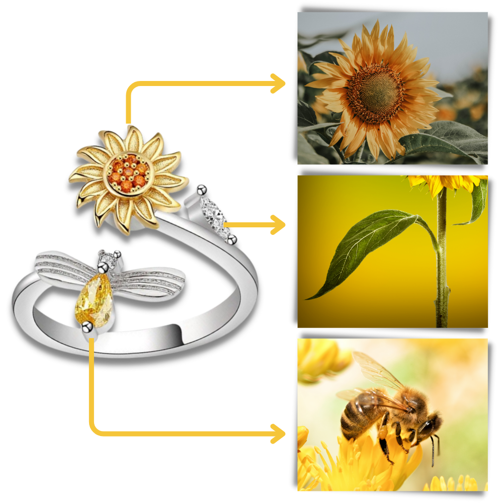 Anel Helevia com girador de girassol, detalhe de girassol dourado e acabamento natural, feito em prata.