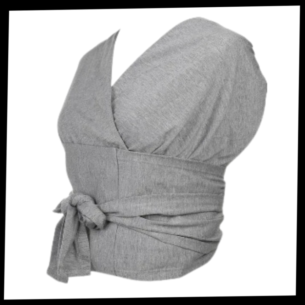 Porte-bébé ergonômico e respirável da marca Moby, suporte confortável para bebê com tecido respirável.