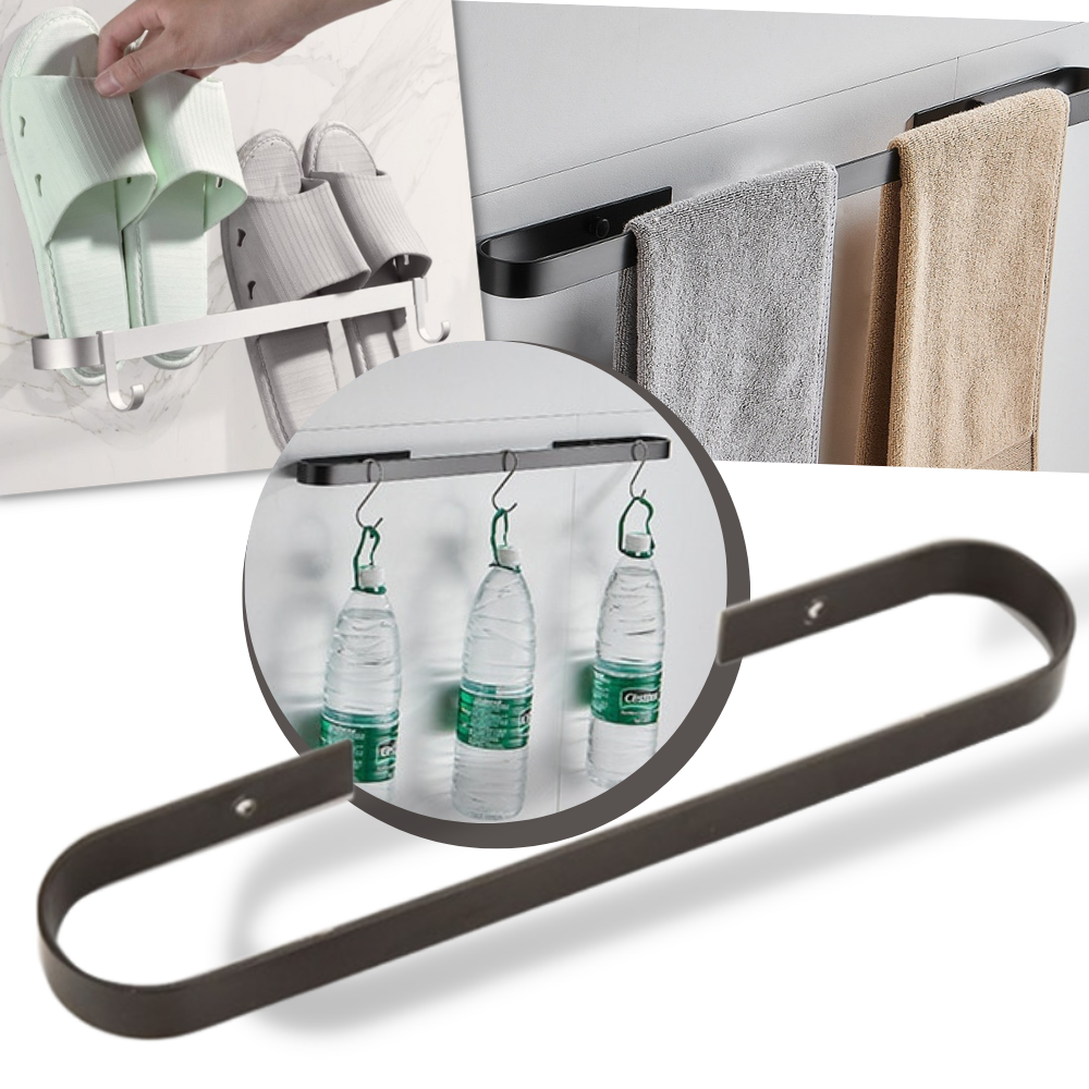 Suporte de parede em alumínio preto para pantuflas, ideal para organização e armazenamento de calçados domésticos.