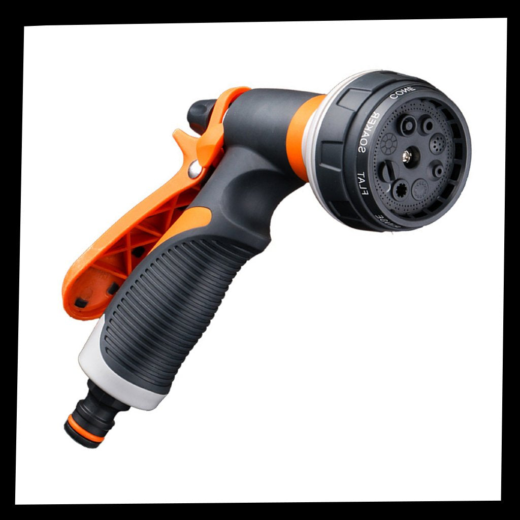 Pistolet d'arrosagem universal Tomshoo com 8 modos para irrigação, mostrado em uso com jato de água variado.