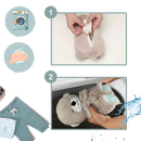 Peluche de loutre apaisante da marca Watonic, ideal para conforto e bem-estar, parte de coffrets e figurines.
