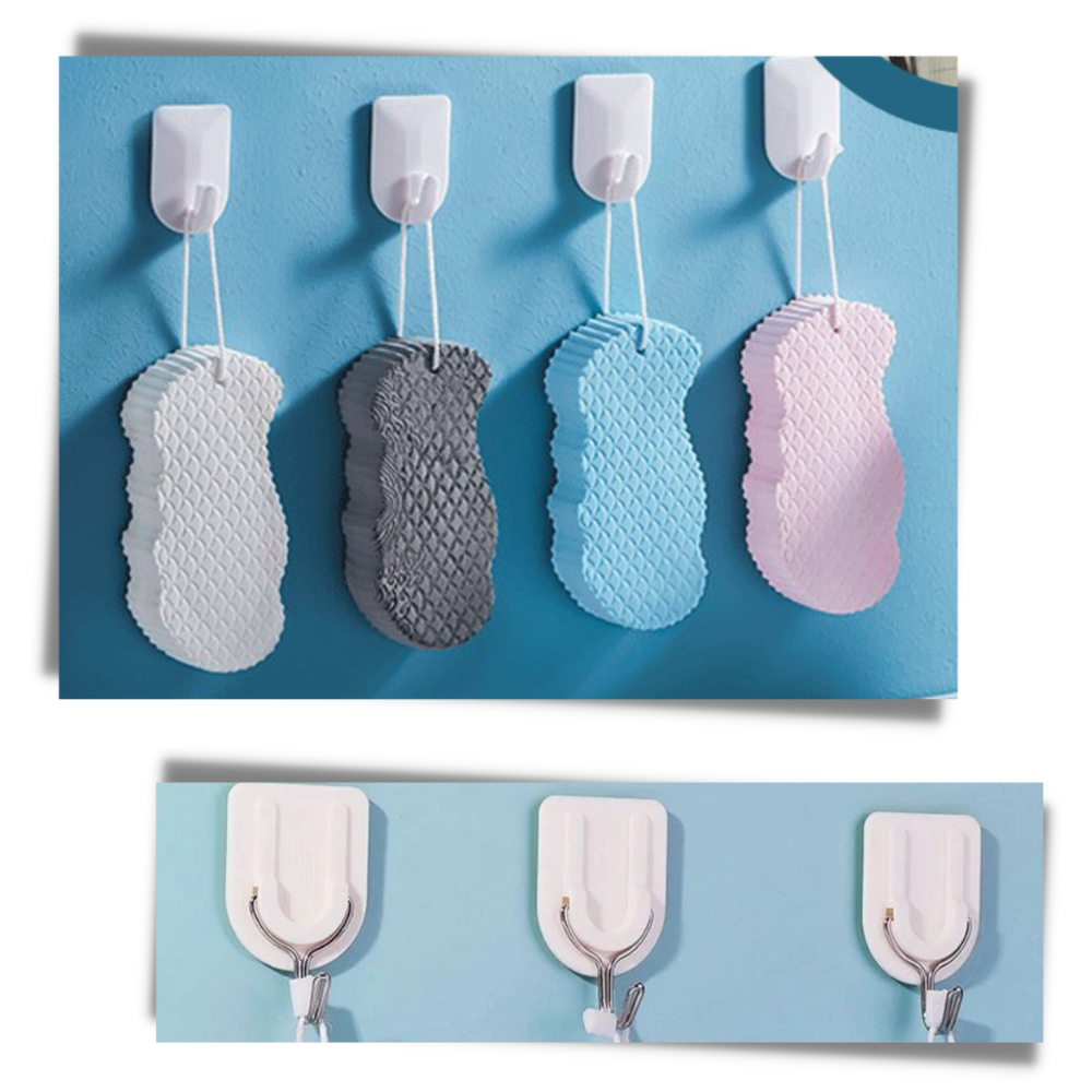 Esponja exfoliante suave para o corpo da marca Ybeny, de cor cinza, ideal para cuidados de pele e limpeza corporal.