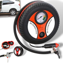 Compresseur de air portable Yks para pneus de carro, usado em manutenção de veículos, com mangueira e mostrador.