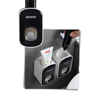 Distributeur de dentifrice mural Yrtoes em preto, para cuidados bucais, com design compacto e moderno.